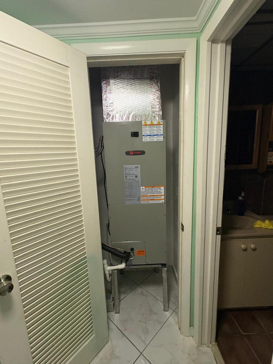 Air handler installed in a utility closet