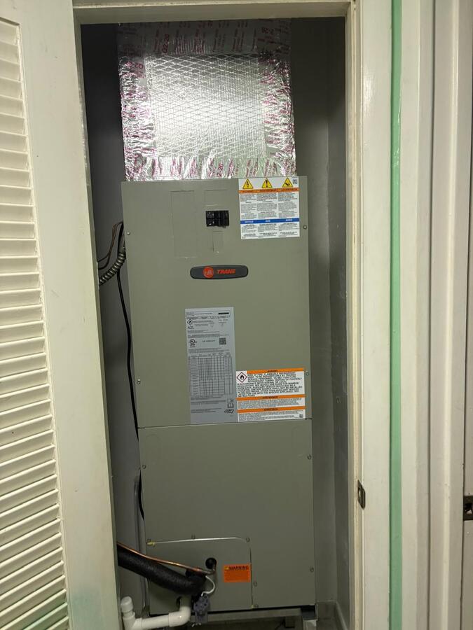Trane air handler installed in a closet